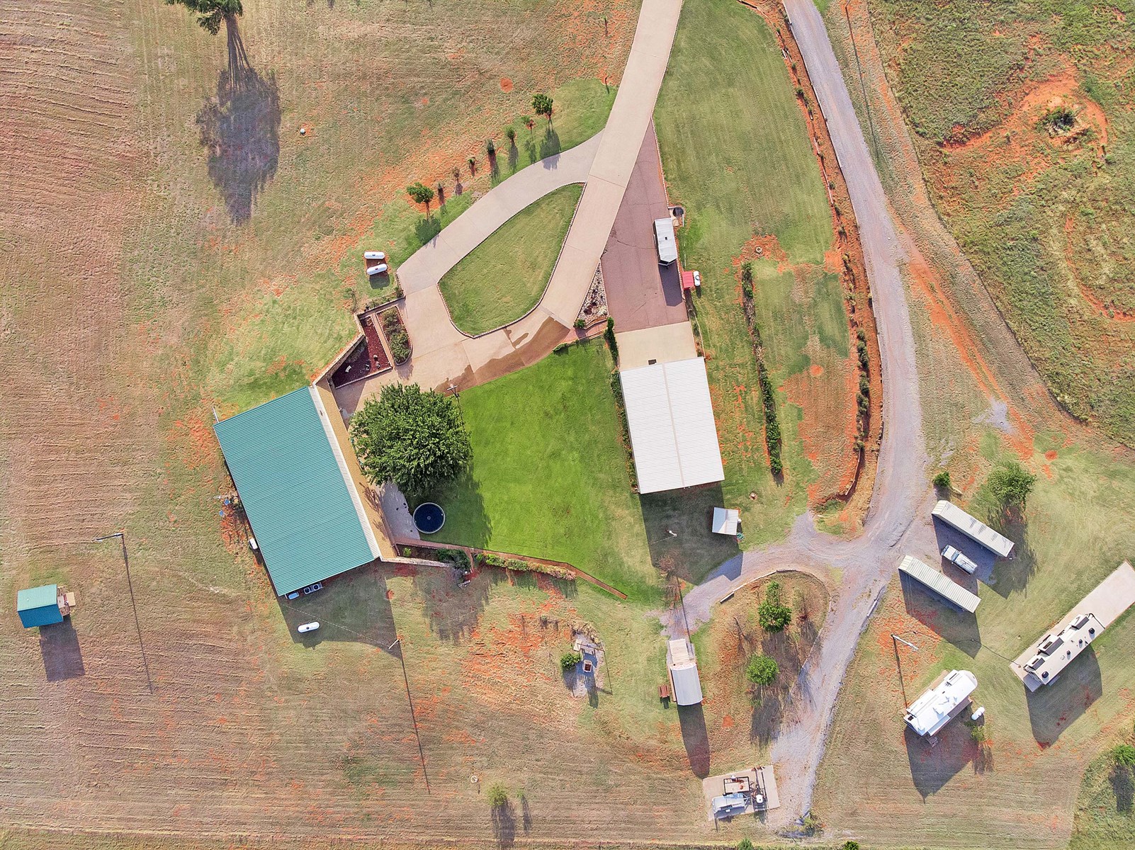 LARGE COUNTRY HOME ON ACREAGE WITH MULTIPLE SHOPS