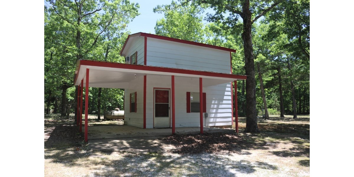 SMALL HOME WITH MULTIPLE RV SITES FOR SALE