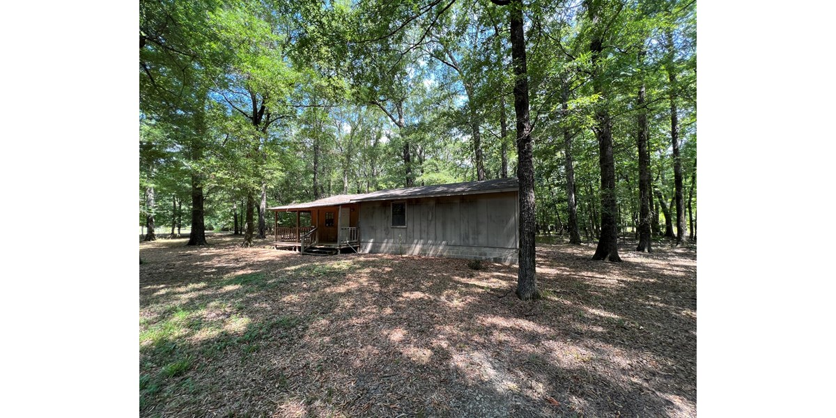 HUNTING/FISHING CAMP FOR SALE ACROSS FROM HURRICANE LAKE WMA