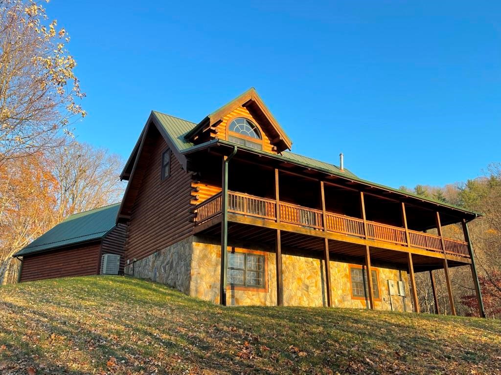 Log Cabin With 26 Acres For Sale Overlooking New River In VA