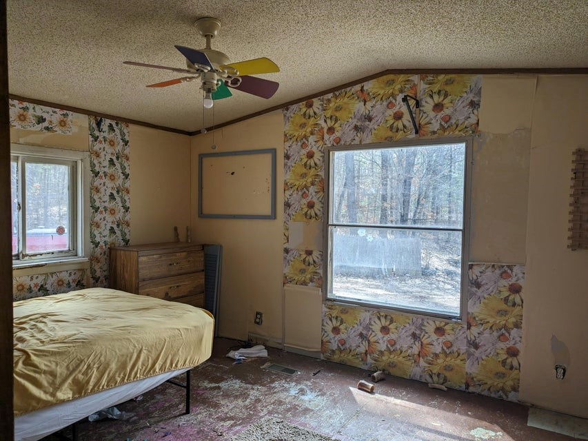 Home with 10 Acres and Pond For Sale Atlanta MI